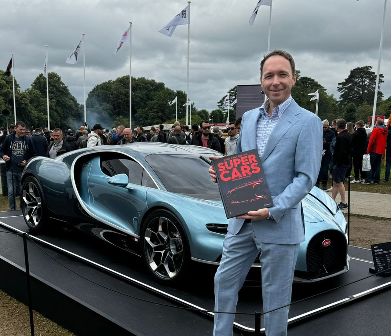 Frank Heyl, Bugatti Torubillon head of design with Rudolf's SuperCars edition book.